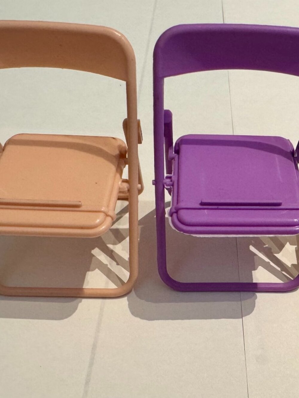 Pink Plastic Folding Chair Cell Phone Stand